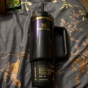 Stanley Black Tumbler with Iridescent Purple and Gold Accents